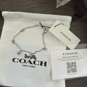 Coach Silver-Tone Horse & Carriage Charm Bracelet